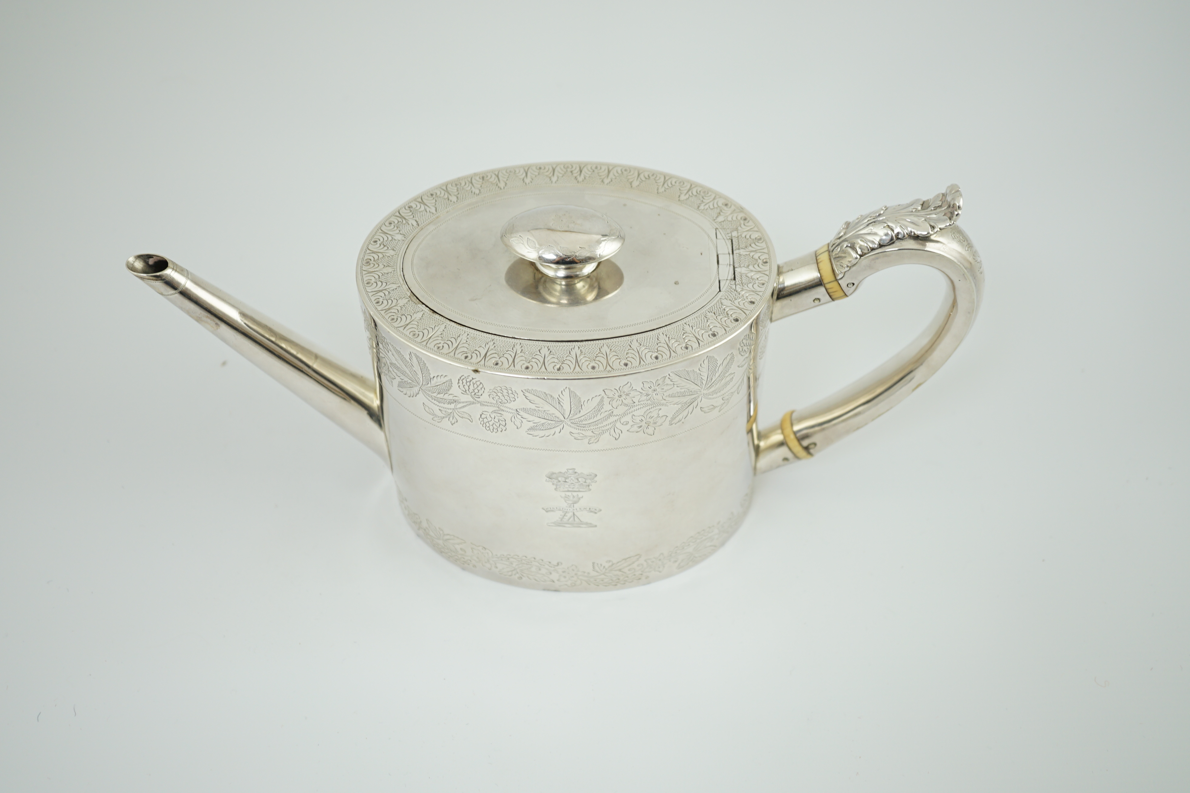 A George IV silver oval teapot by Eames & Barnard, engraved with Coat of Arms of the Duke of Bedford and Earl Compton